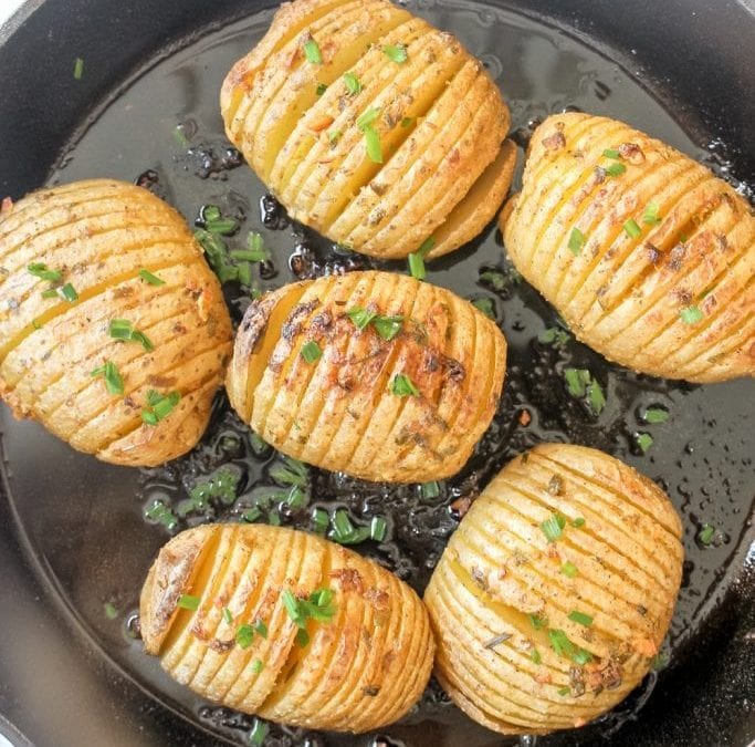 Hasselback Potato Skillet with Mustard Garlic Butter + Chives!